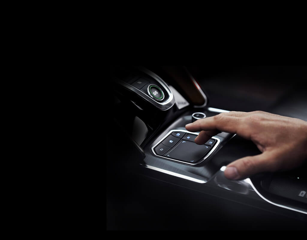  Hand Touching Interior Control Pad on 2023 Acura TLX Sedan